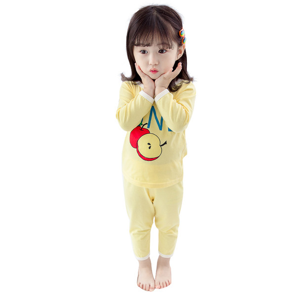 Model nou de pijamale pentru copii alb si galben cu aplicatie