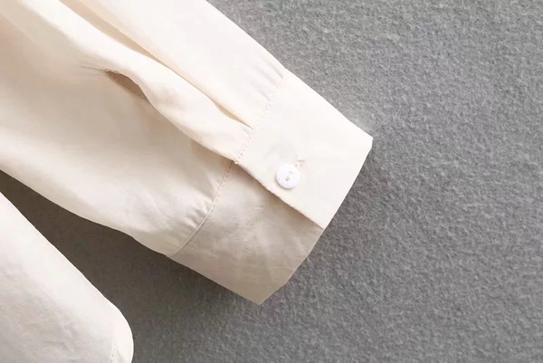 Modern női ing - fehér aszimmetrikus modell