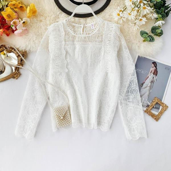 Stílusos női blúz, hosszú ujjú fekete-fehér színben