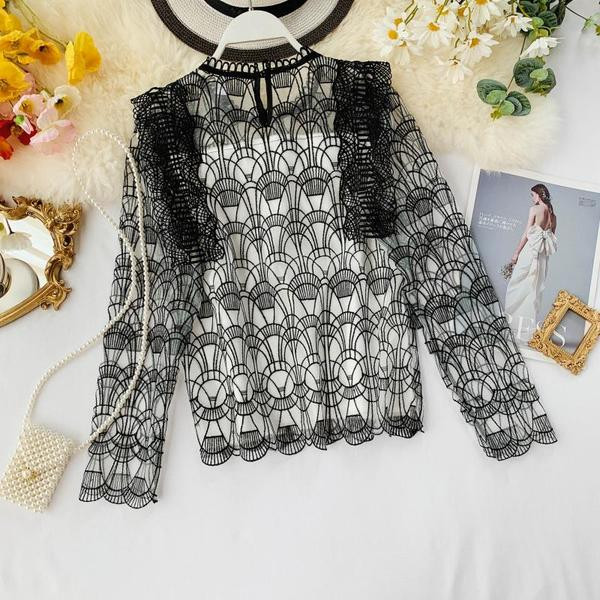 Stílusos női blúz, hosszú ujjú fekete-fehér színben