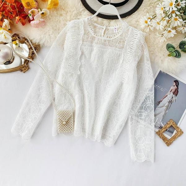 Stílusos női blúz, hosszú ujjú fekete-fehér színben