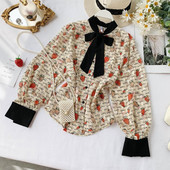 Modern női ing szalaggal és színes mintával