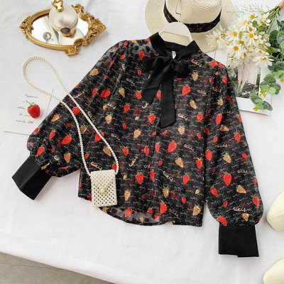 Modern női ing szalaggal és színes mintával