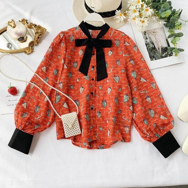 Modern női ing szalaggal és színes mintával