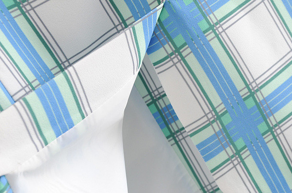 Női kockás kabát gombokkal