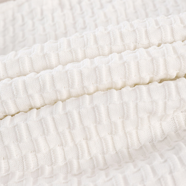 Set elegant pentru femei, care include un cardigan și o rochie alb-negru