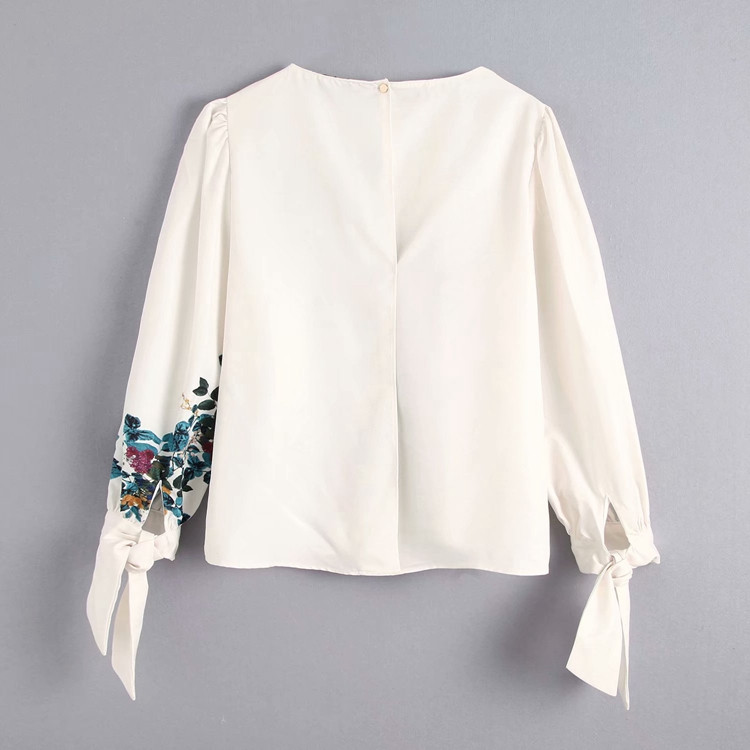 Bluza eleganta de dama cu imprimeu floral si cravate la maneca