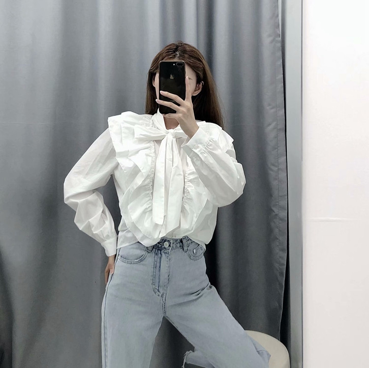 Elegáns női blúz megkötős fehér színben