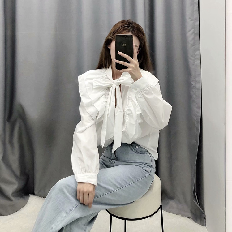Elegáns női blúz megkötős fehér színben