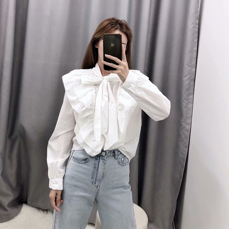 Elegáns női blúz megkötős fehér színben