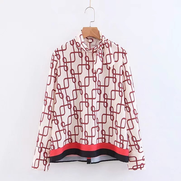 Színes motívumú, O-nyakú női blúz