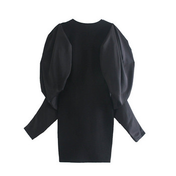 Elegáns fekete ruha mély V-nyakkal