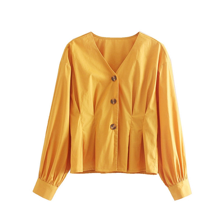 Sárga színű gombos és hosszú ujjú ing