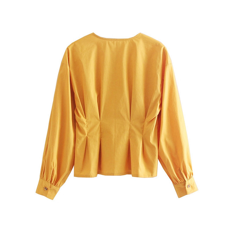 Sárga színű gombos és hosszú ujjú ing