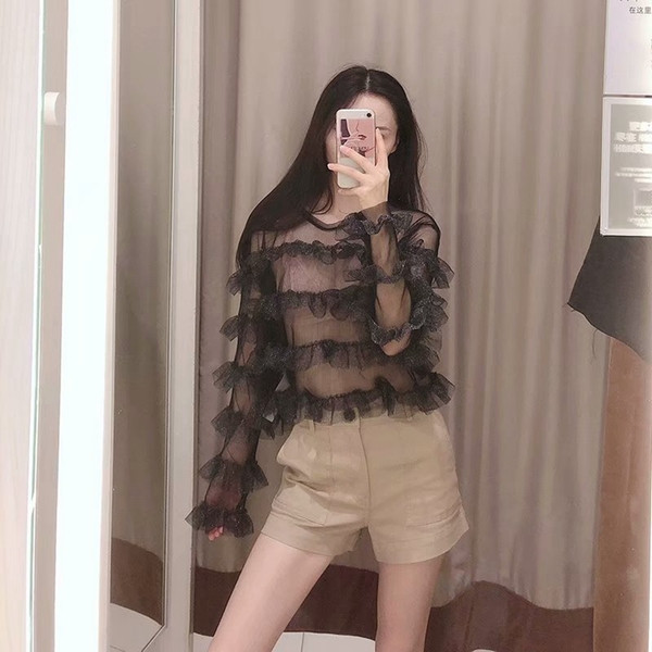 Átlátszó tüll blúz fekete színben