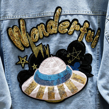 Geaca de dama din denim model lat cu aplicatie pe spate