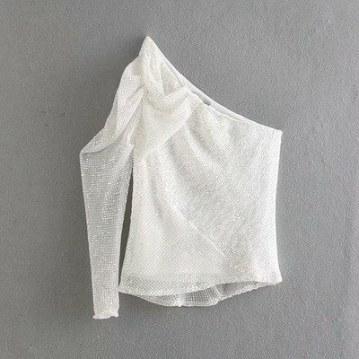 Bluza de dama eleganta cu umar gol in alb cu efect stralucitor