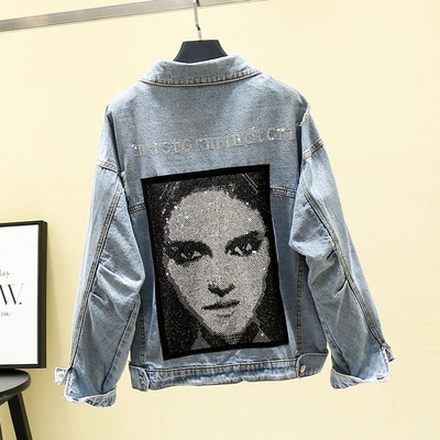 Modern női farmerdzseki mintával, szakadt mintákkal, kék színben