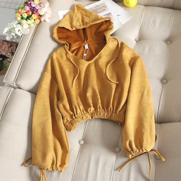 Női pulóver kapucnival és ujjkötővel több színben