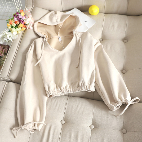 Női pulóver kapucnival és ujjkötővel több színben