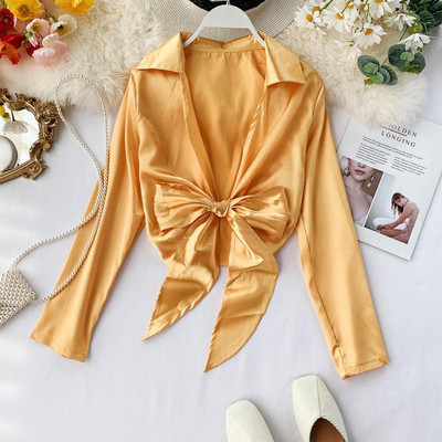 Modern női ing mély nyakkivágással, szalaggal több színben