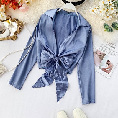 Modern női ing mély nyakkivágással, szalaggal több színben