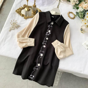 Stílusos női ruha gallérral és fekete hímzéssel