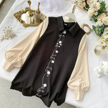 Stílusos női ruha gallérral és fekete hímzéssel