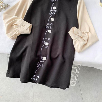 Stílusos női ruha gallérral és fekete hímzéssel