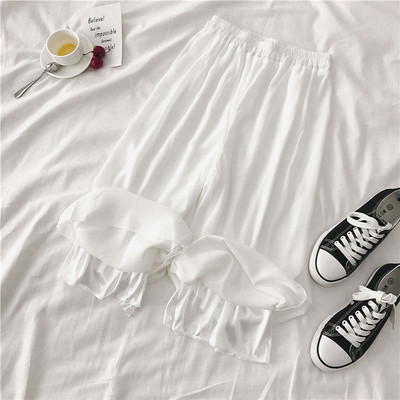 Női széles modellnadrág fehér és fekete színben