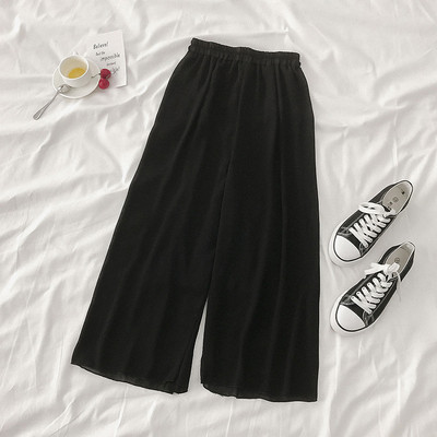 Női széles modellnadrág fehér és fekete színben