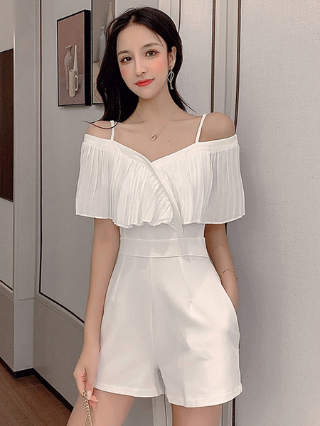 Stílusos női overall fehér és fekete színben