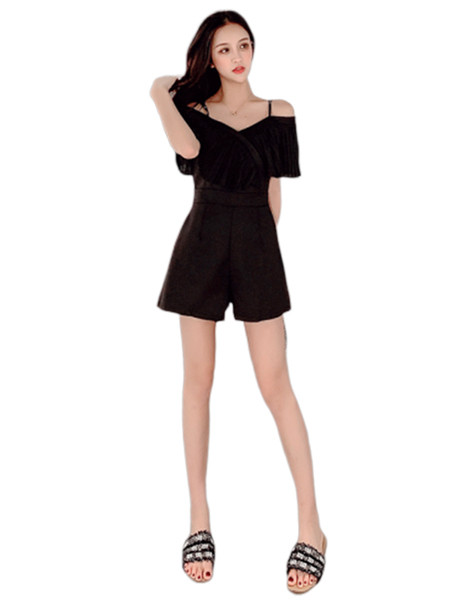 Stílusos női overall fehér és fekete színben