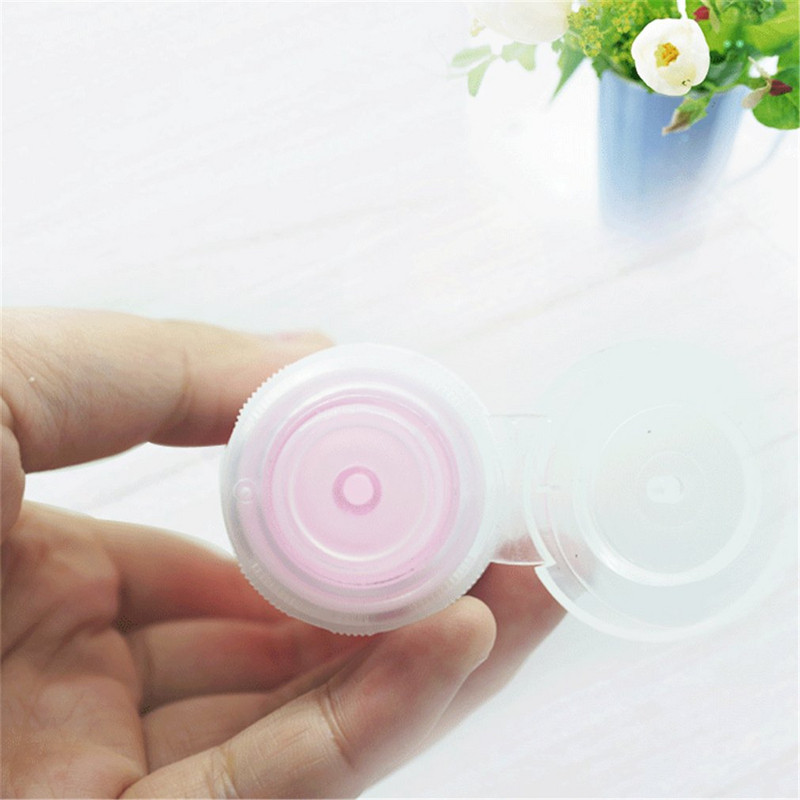 Flacon portabil din silicon colorat pentru depozitarea șamponului, protecției solare și articolelor de toaletă - 80ml