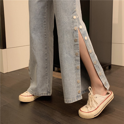 Blugi de dama actuali cu nasturi de culoare albastra