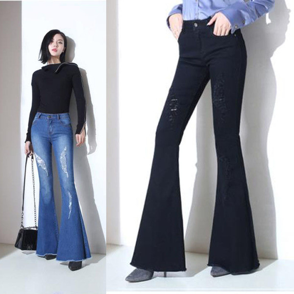 Stílusos női farmer szakadt motívumokkal fekete és kék színben