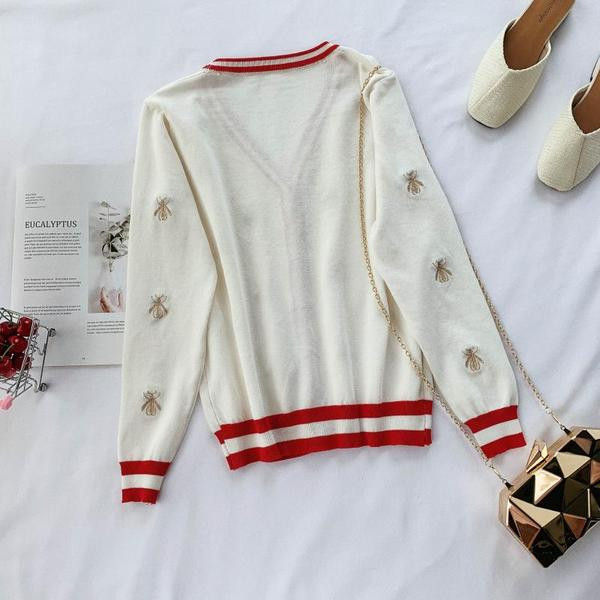 Modern női mellény V-nyakkal és fekete-fehér hímzéssel