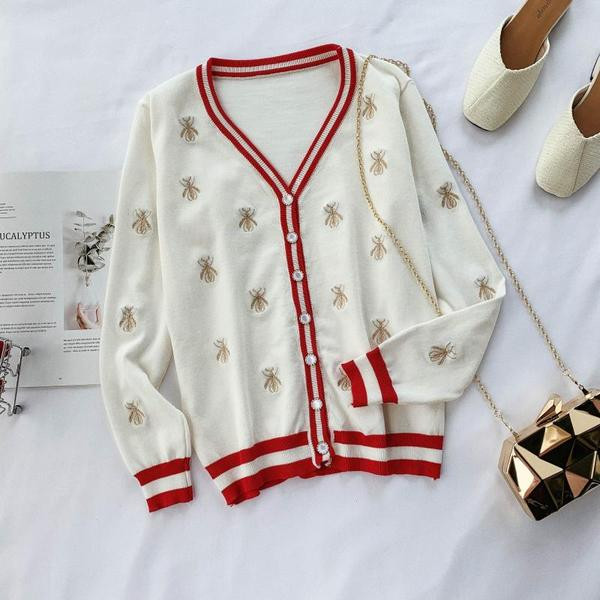 Modern női mellény V-nyakkal és fekete-fehér hímzéssel