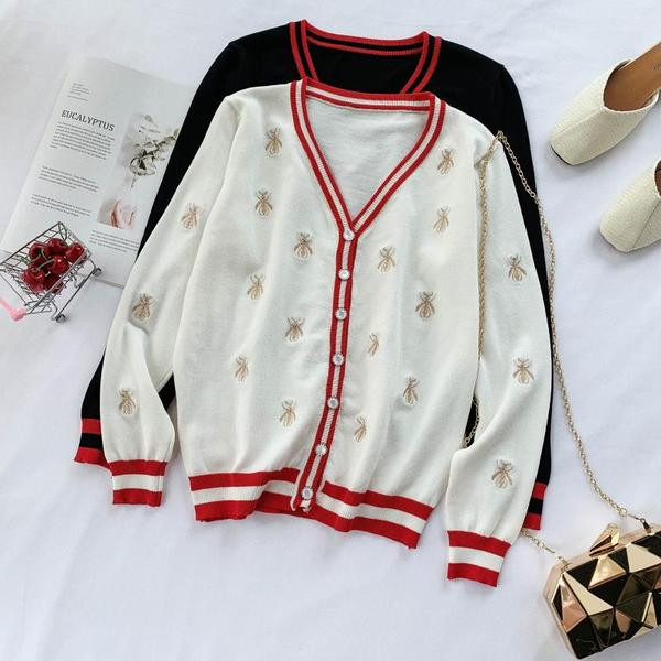 Modern női mellény V-nyakkal és fekete-fehér hímzéssel