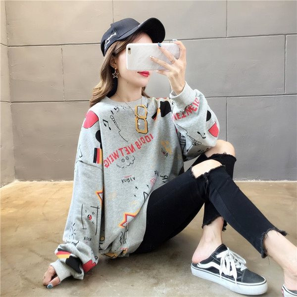 Aktuális női blúz színes rátéttel - hosszú modell