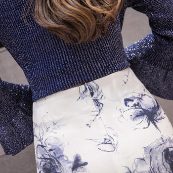 Fusta de dama eleganta de culoare alba cu motive florale