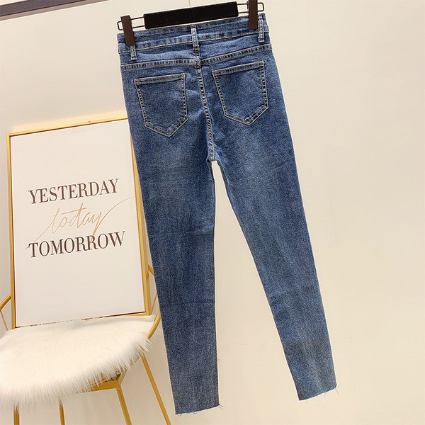 Hosszú, kék színű női farmer