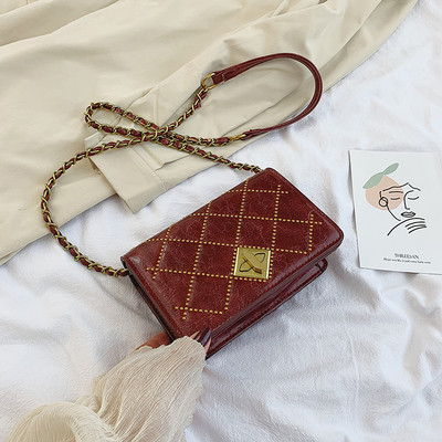 Geanta de dama moderna din piele cu inchizatoare metalica