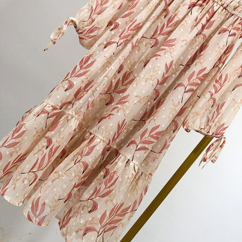 Elegáns hosszú női ruha színes mintával