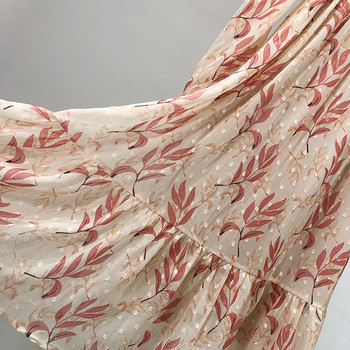 Elegáns hosszú női ruha színes mintával