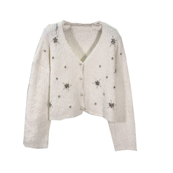 Rövid női mellény gyöngyház gombokkal, fehér színben