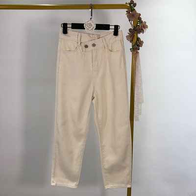 Női farmer aszimmetrikus rögzítéssel, két színben