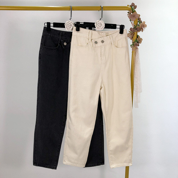 Női farmer aszimmetrikus rögzítéssel, két színben