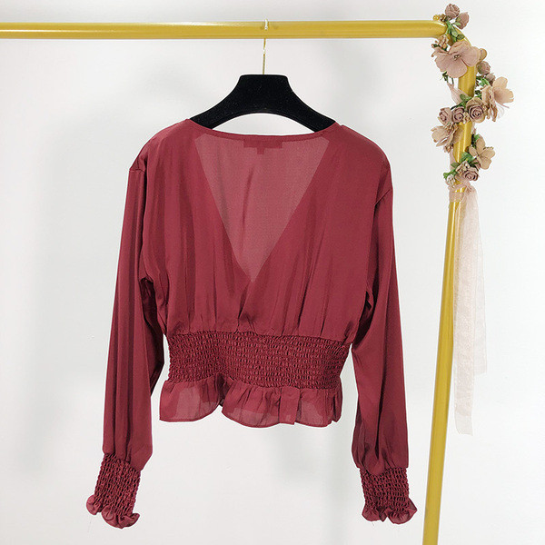 Női blúz V-nyakkal, elasztikus derékkal