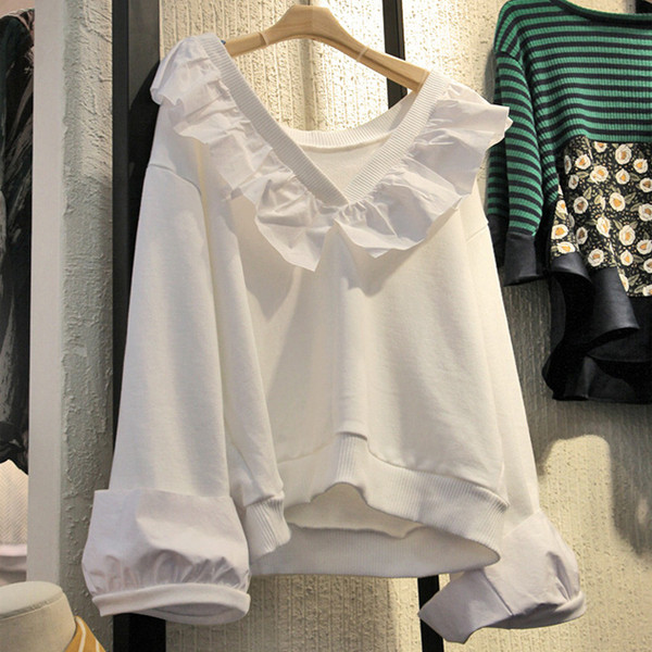 Modern női blúz V-nyakkal, fehér színben